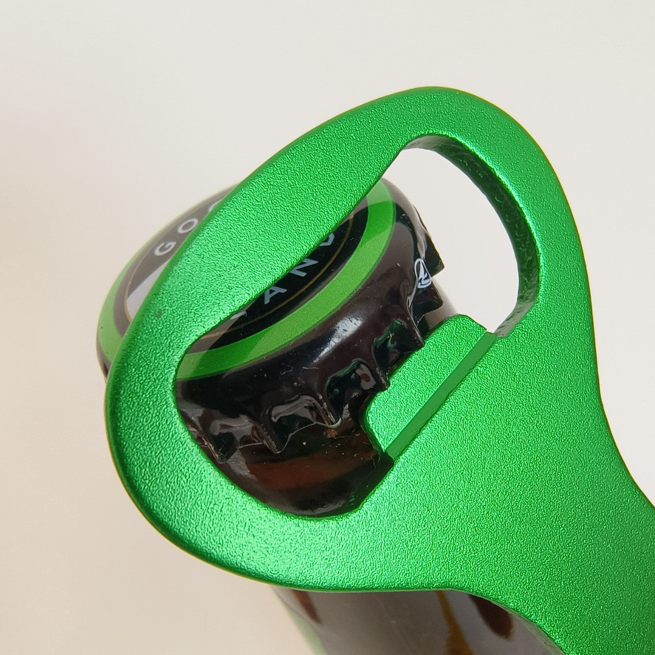 Multi-functional beer bottle opener