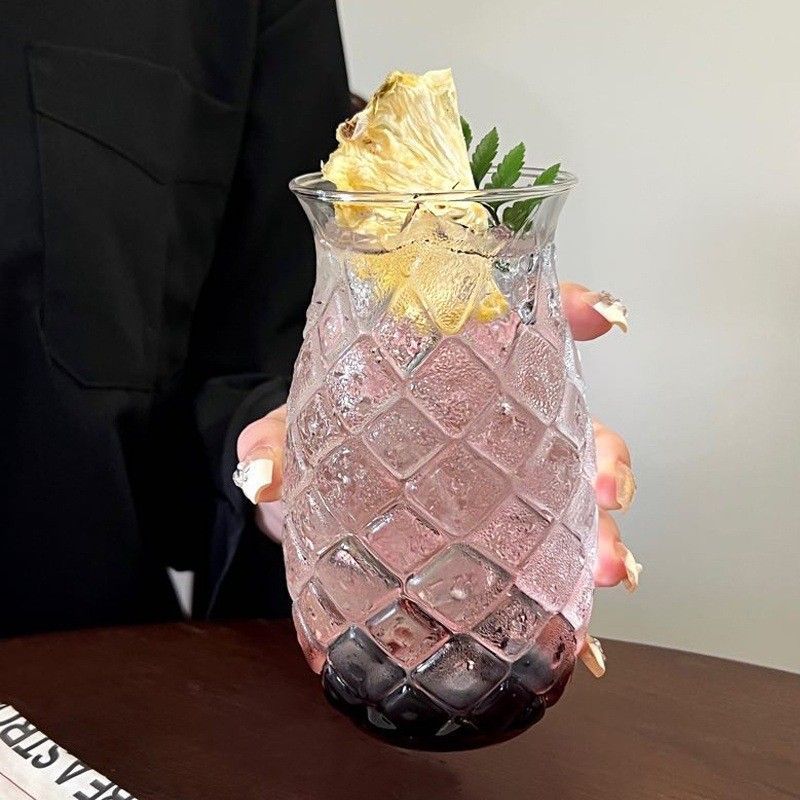 Transparent pineapple juice glass